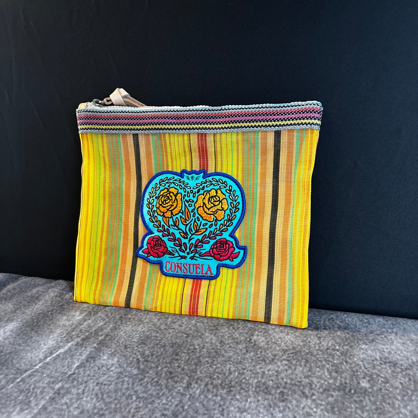 CONSUELA Mesh Multi Stripe Clutch Bag, Signature Label Design, Zipper closure