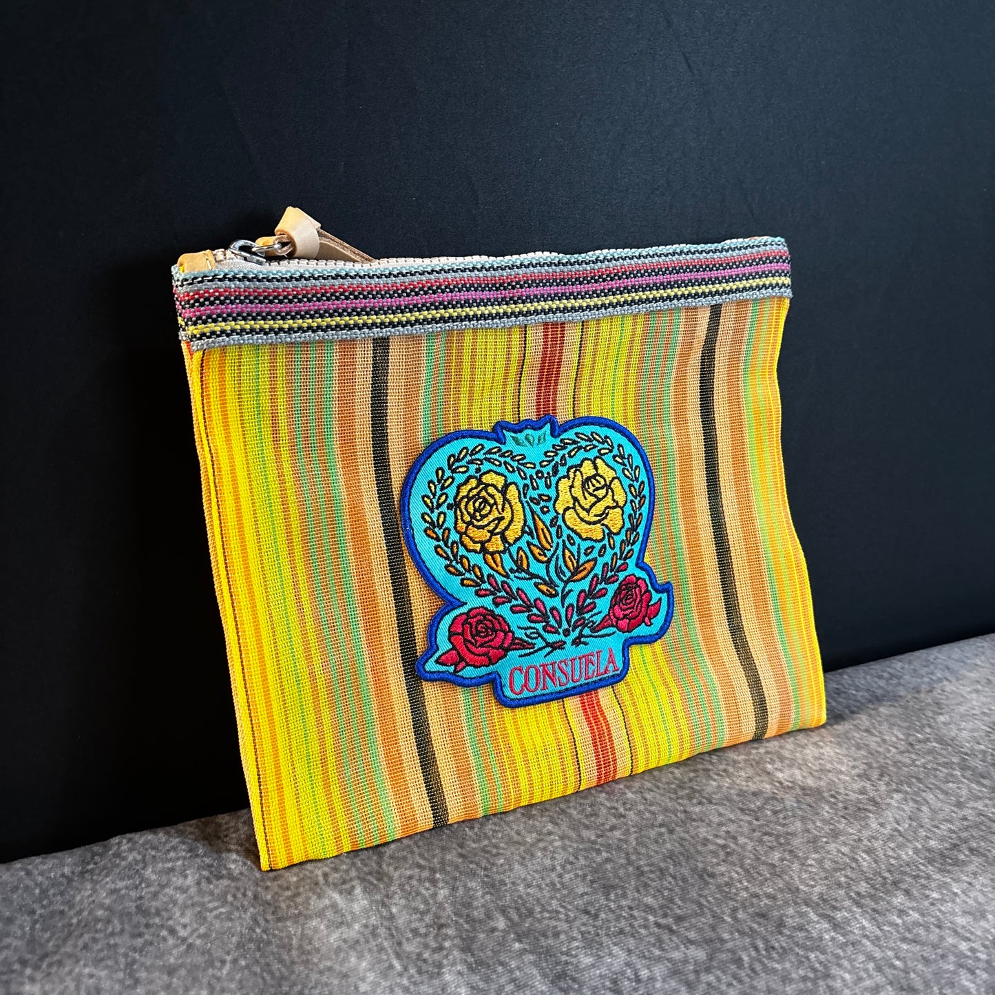 CONSUELA Mesh Multi Stripe Clutch Bag, Signature Label Design, Zipper closure
